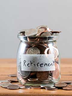 jar of money with the word retirement on it